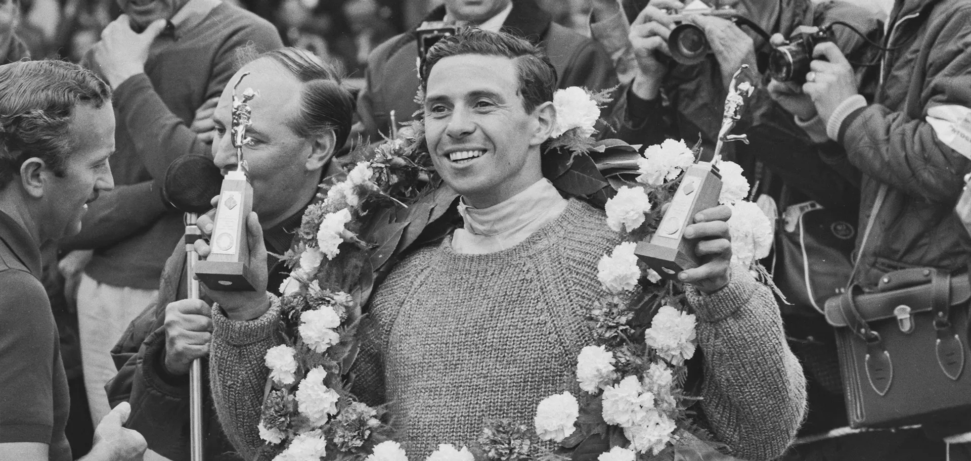 Jim Clark - Légende Lotus F1 Portrait de Jim Clark au volant de sa Lotus de Formule 1 lors de sa saison de champion du monde.